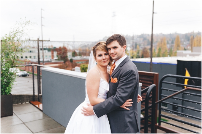 Bride and groom portraits at the Fremont Foundry in Seattle. Image captured by Ardita Kola Photography.