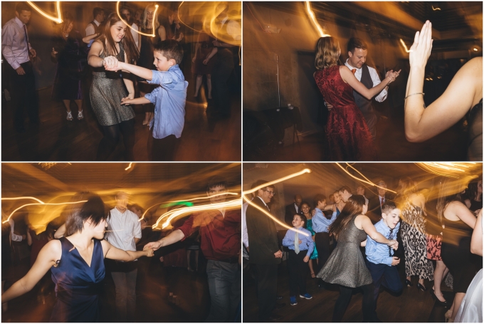 Guests dancing during wedding reception at the Fremont Foundry in Seattle. Image captured by Ardita Kola Photography.