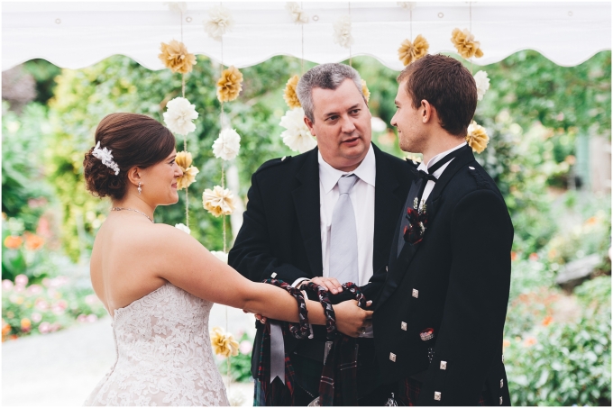 Photo of wedding ceremony at a Scottish American Wedding @ Glen Echo Gardens in Bellingham, WA captured by Ardita Kola Photography
